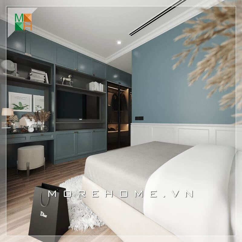 Thiết kế tủ đồ màu xanh lam kết hợp kệ tv phòng ngủ chung cư, nhà phố rất đẹp và tiện nghi, màu sắc cá tính và nổi bật. Thiết kế kệ để đồ âm tường cạnh giường ngủ rất tiện lợi tối giản diện tích căn phòng, giúp căn phòng ngủ trở nên rộng và tiện nghi hơn. Thiết kế chung cư hiện đại