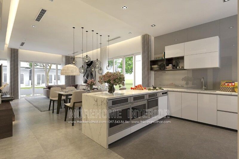 Tủ bếp gỗ Acrylic màu trắng kết hợp với đá ốp bếp màu bóng màu lông chuột tạo nên một không gian bếp thật thông thoáng và tươi mới.