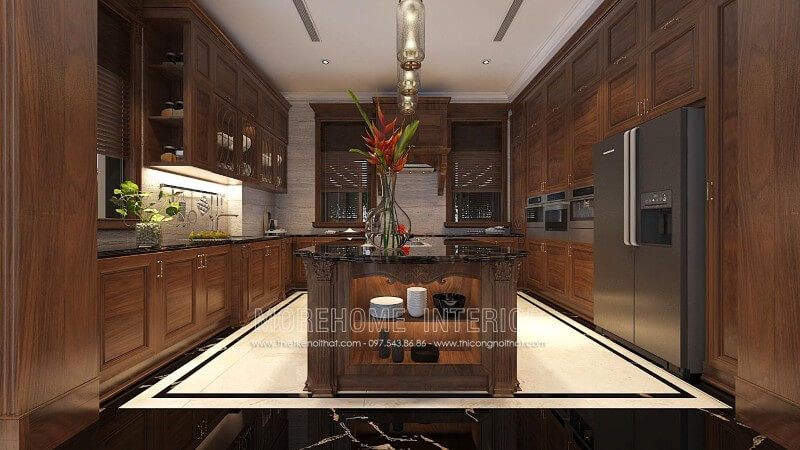 Mẫu tủ bếp tân cổ điển được làm từ gỗ óc chó nhập khẩu cao cấp với những nét chạm khắc hoa văn cầu kì, tỉ mỉ kết hợp với những màu sắc óc chó sang trọng, tạo nên một không gian cuốn hút mà bất kì ai cũng muốn sở hữu