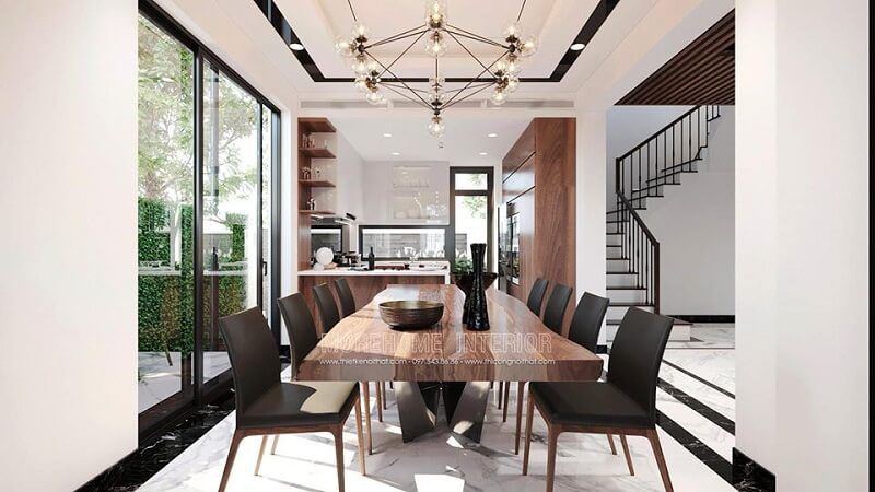 Mẫu bàn ăn gỗ óc chó nguyên tấm kết hợp với ghế ăn bọc nệm tạo nên bộ bàn ăn sang trọng cho không gian phòng ăn biệt thự gia chủ