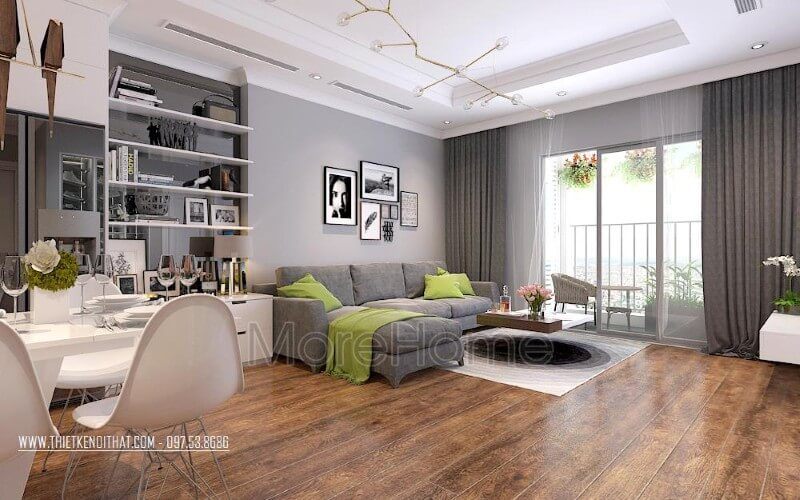 Bộ sofa bọc nỉ màu xám được coi là điểm nhấn chủ đạo cho cả không gian, gợi sự liền mạch trong thiết kế và sự kết nối của các đồ vật trong căn nhà